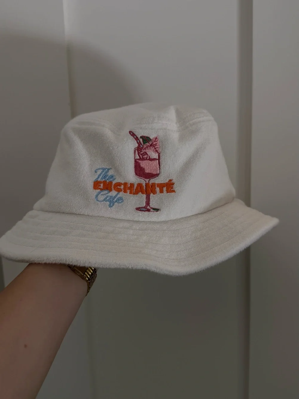 The Enchanté Cafe bucket hat in white terry cloth